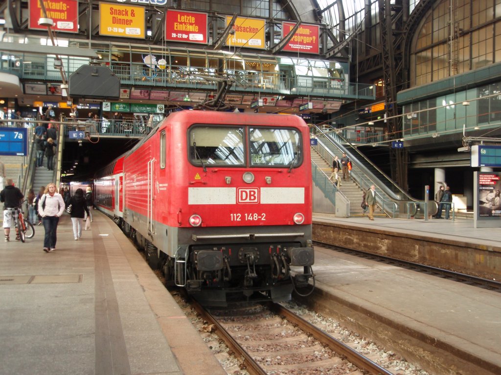 112 148 als RE aus Kiel Hbf in Hamburg Hbf. 24.04.2010