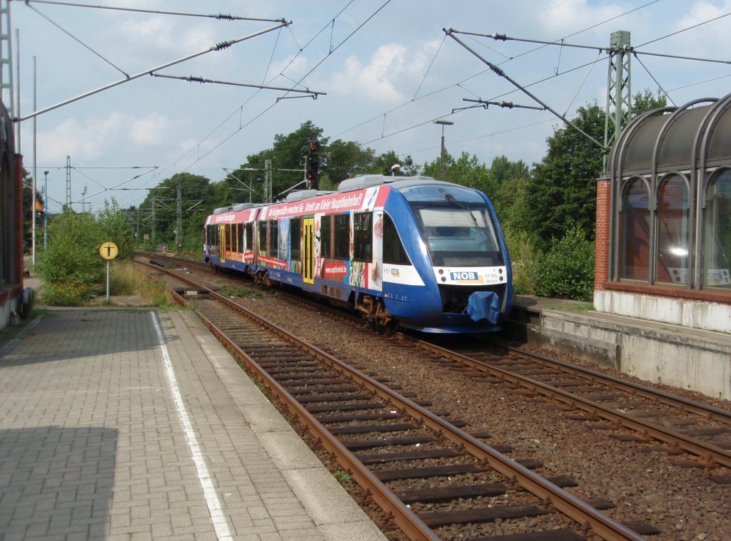 VT 303 der Nord-Ostsee-Bahn als NOB Kiel Hbf - Husum bei der Ausfahrt aus Rendsburg. 09.08.2009