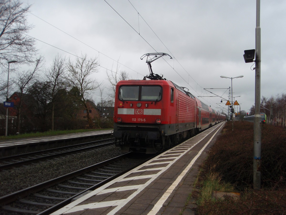 112 175 als RE 70 Kiel Hbf - Hamburg-Altona in Wrist. 21.03.2015