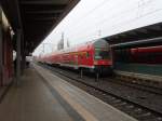 DB Regio Nordost Ein Doppelstock Steuerwagen als S 1 nach Warnem�nde bei der Ausfahrt aus Rostock Hbf. 20.03.2010