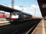 DB Regio Bayern/63744/185-554-der-mrce-als-re 185 554 der MRCE als RE Wrzburg Hbf - Frankfurt (Main) Hbf in Hanau Hbf. 10.04.2010
