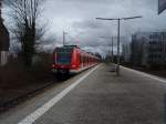 ET 423 423 933 als S 4 Langen (Hessen) - Kronberg (Taunus) bei der Einfahrt in Niederh�chstadt. 27.03.2010