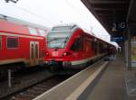 ET 429 f�nfteiliger STADLER FLIRT Ein ET 429 als RE 9 aus Sassnitz in Rostock Hbf. 20.03.2010