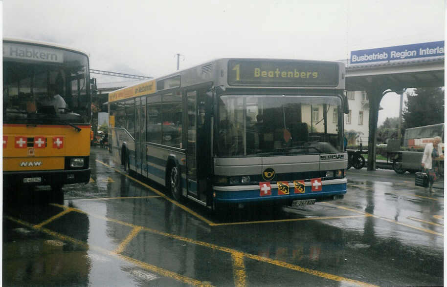 (018'320) - AAGI Interlaken - Nr. 32/BE 247'820 - Neoplan am 1. August 1997 beim Bahnhof Interlaken West