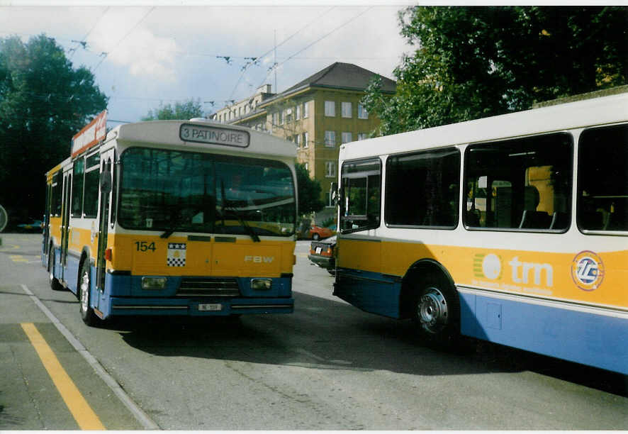 (019'913) - TC La Chaux-de-Fonds - Nr. 154/NE 559 - FBW/Hess-Haag am 7. Oktober 1997 beim Bahnhof La Chaux-de-Fonds