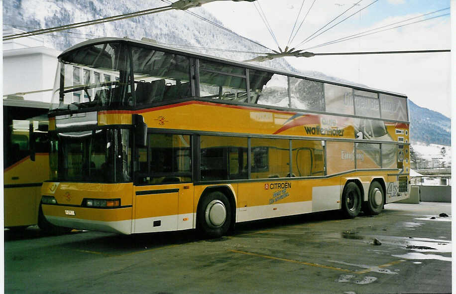 (038'426) - PTT-Regie - P 27'805 - Neoplan am 1. Januar 2000 in Chur, Postautostation