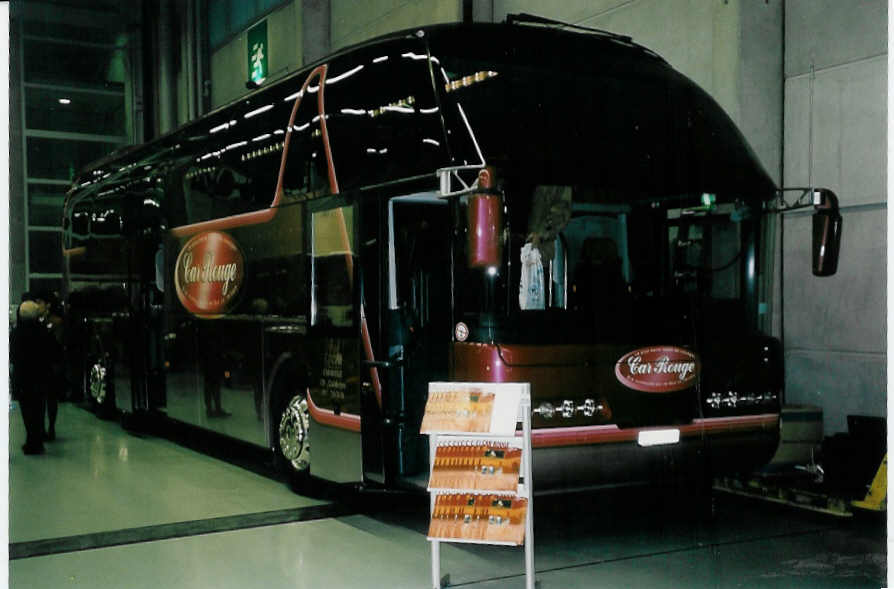 (051'636) - Car Rouge, Kerzers - Nr. 12/FR 300'612 - Neoplan am 19. Januar 2002 in Bern, Ferienmesse