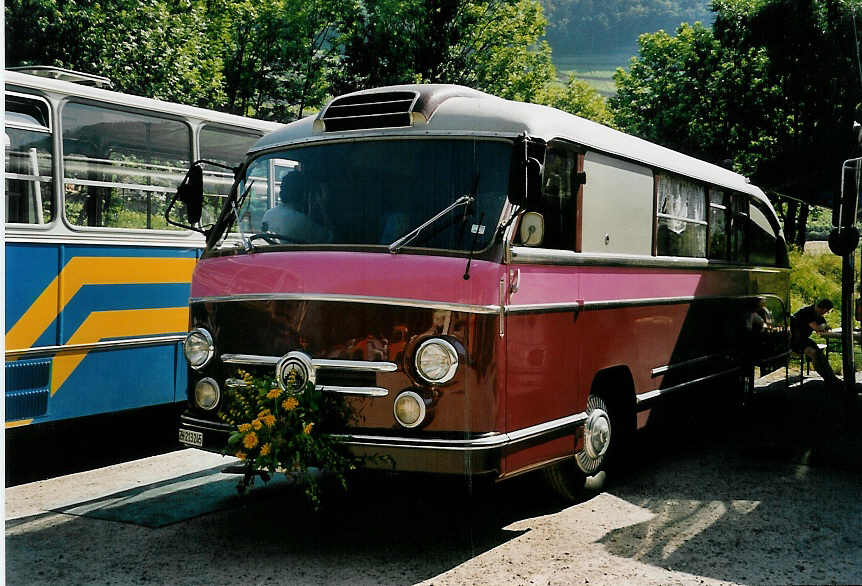 (053'930) - Schaufelberger, Pfffikon - ZH 213'245 - Saurer/Saurer (ex YSC Yverdon) am 22. Juni 2002 in Aigle, Saurertreffen