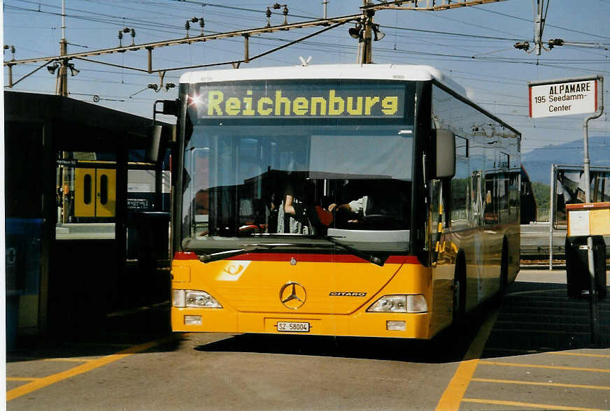 (055'120) - Kistler, Reichenburg - SZ 58'004 - Mercedes am 27. Juli 2002 beim Bahnhof Pfffikon