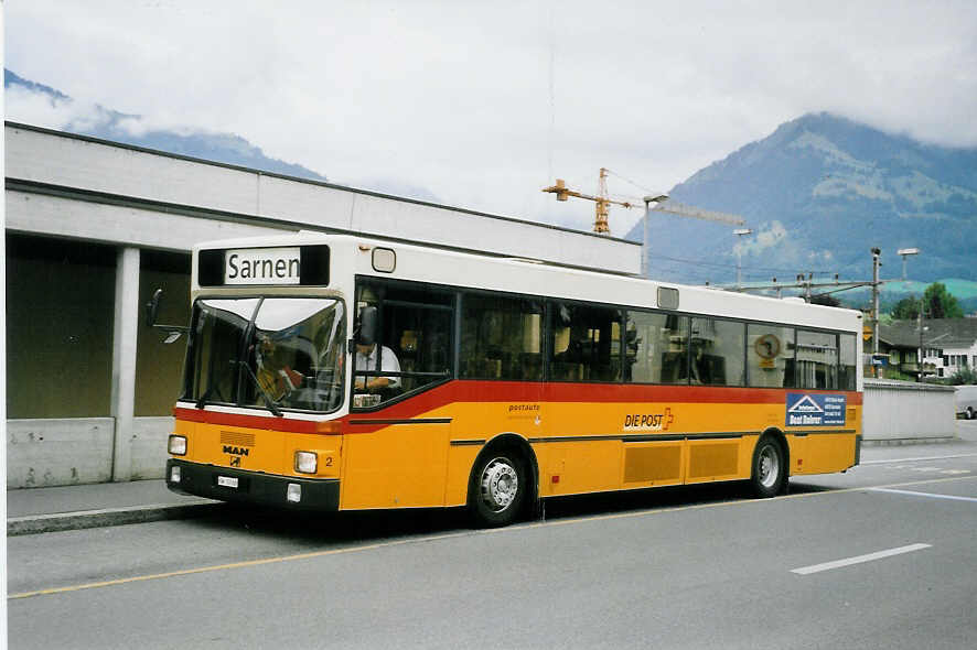 (062'029) - Dillier, Sarnen - Nr. 2/OW 10'166 - MAN am 28. Juli 2003 beim Bahnhof Sarnen