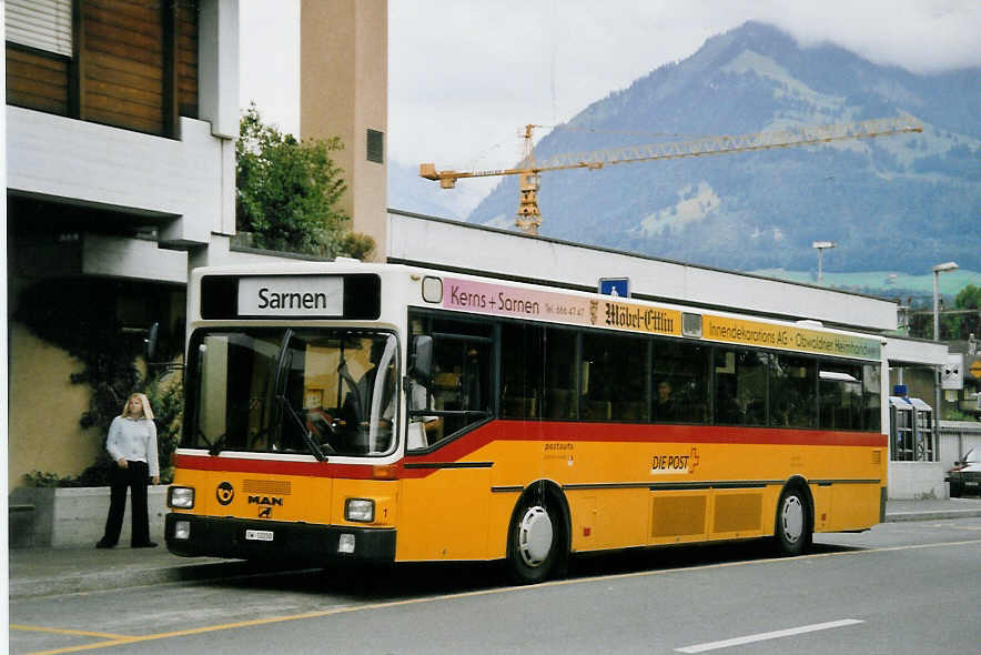 (062'030) - Dillier, Sarnen - Nr. 1/OW 10'200 - MAN am 28. Juli 2003 beim Bahnhof Sarnen