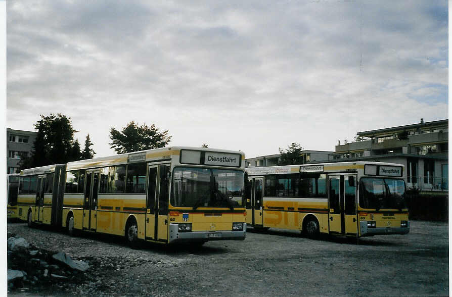 (068'019) - STI Thun - Nr. 65/BE 435'065 + Nr. 63/BE 433'663 - Mercedes am 23. Mai 2004 in Thun, Garage