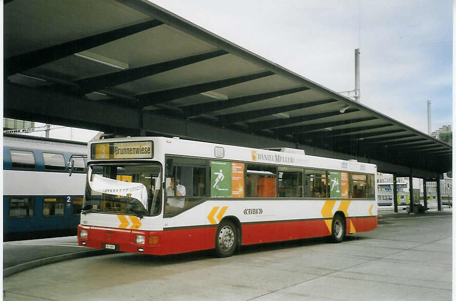 (068'402) - RVBW Wettingen - Nr. 64/AG 5891 - MAN am 19. Juni 2004 beim Bahnhof Baden