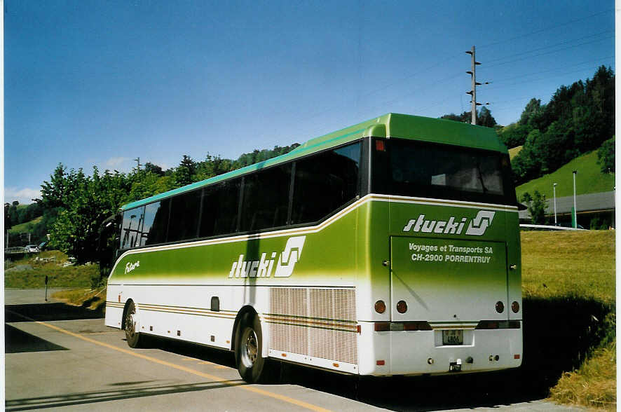 (068'814) - Stucki, Porrentruy - JU 4806 - Bova am 3. Juli 2004 beim Bahnhof Mlenen