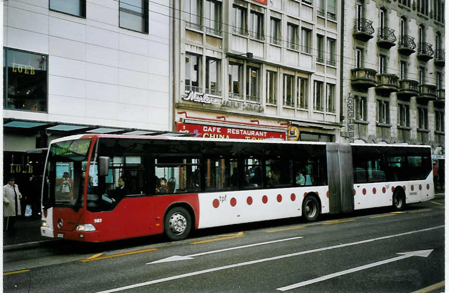 (074'628) - TPF Fribourg - Nr. 583/FR 300'390 - Mercedes am 12. Februar 2005 beim Bahnhof Fribourg