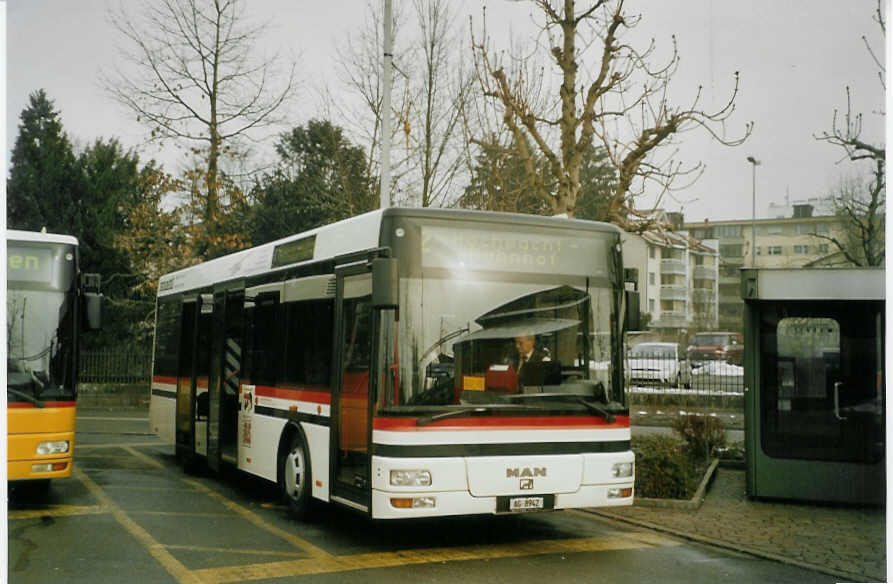 (082'133) - Geissmann, Hgglingen - AG 8942 - MAN am 27. Dezember 2005 beim Bahnhof Wohlen