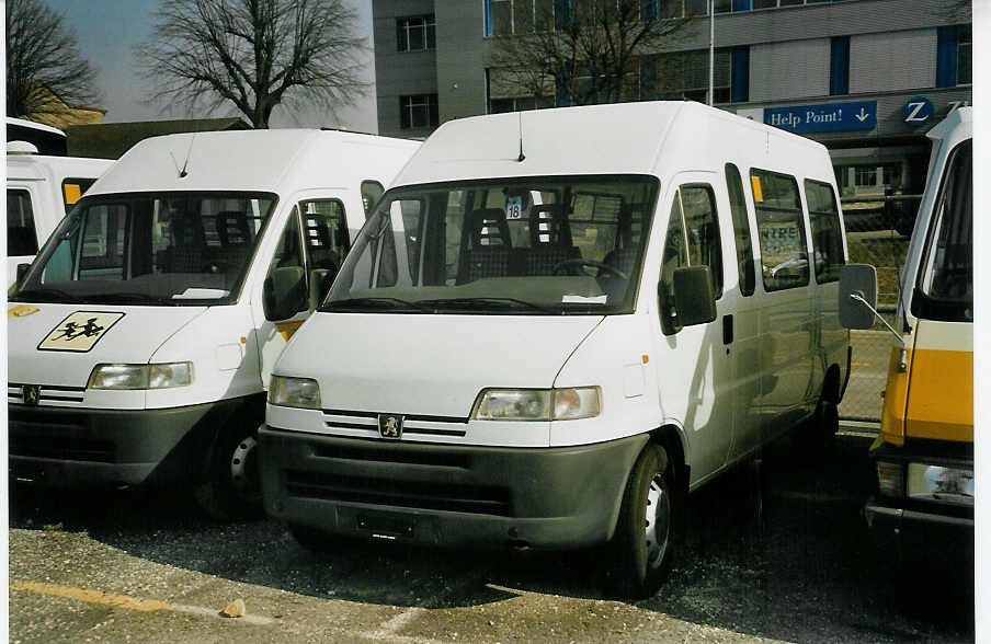 (084'001) - CarPostal Vaud-Fribourg - Peugeot am 19. Mrz 2006 in Yverdon, Garage