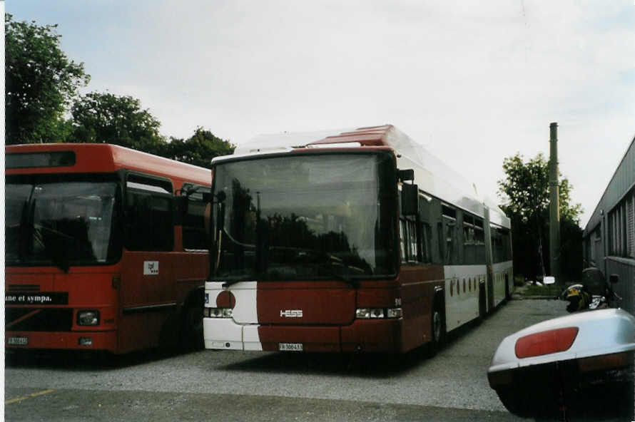 (087'636) - TPF Fribourg - Nr. 518/FR 300'433 - MAN/Hess Gelenkduobus am 26. Juli 2006 in Fribourg, Garage