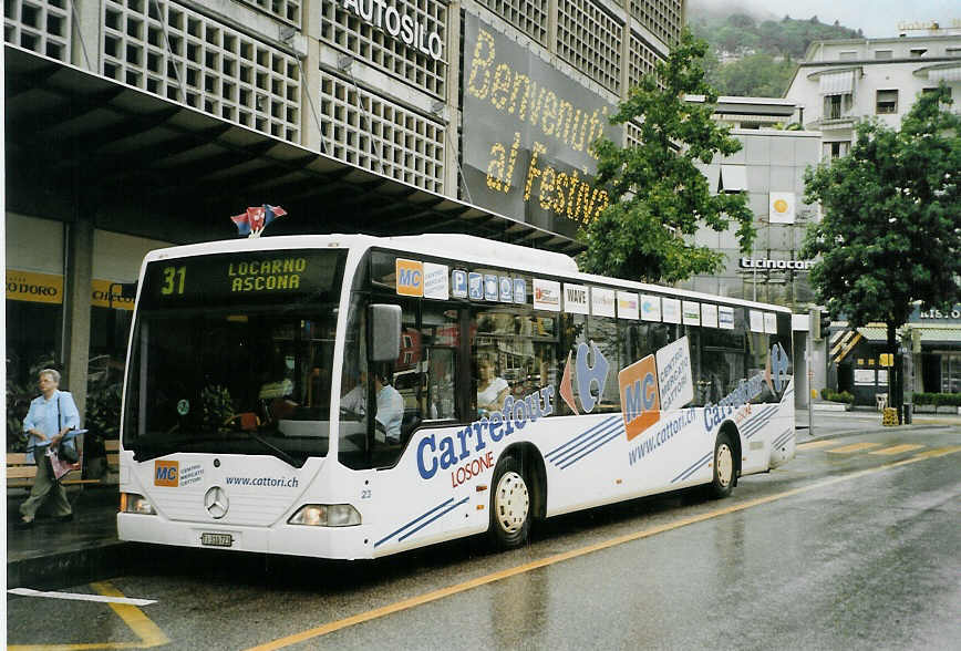 (088'635) - FART Locarno - Nr. 23/TI 310'723 - Mercedes am 3. August 2006 beim Bahnhof Locarno