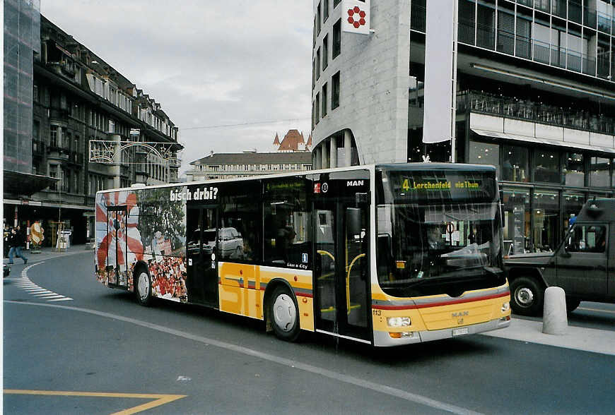 (090'927) - STI Thun - Nr. 113/BE 700'113 - MAN am 8. Dezember 2006 beim Bahnhof Thun