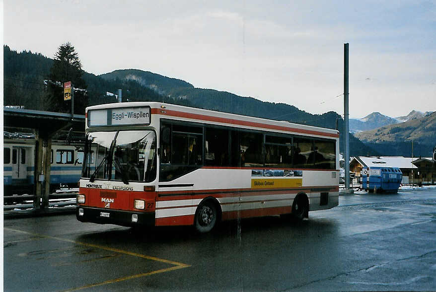 (091'204) - MOB Montreux - Nr. 27/BE 146'921 - MAN (ex BSF Hochdorf) am 31. Dezember 2006 beim Bahnhof Gstaad