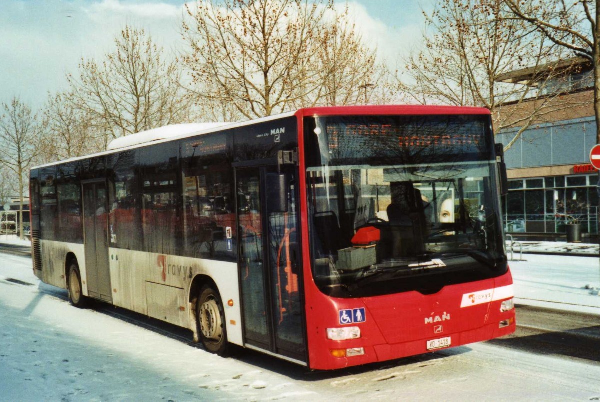 (114'137) - TRAVYS Yverdon - VD 1418 - MAN am 14. Februar 2009 beim Bahnhof Yverdon