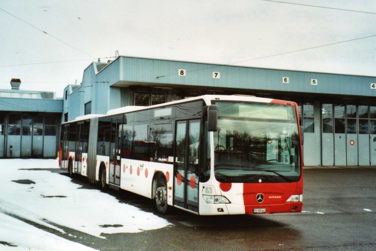 (114'227) - TPF Fribourg - Nr. 595/FR 300'440 - Mercedes am 14. Februar 2009 in Fribourg, Garage