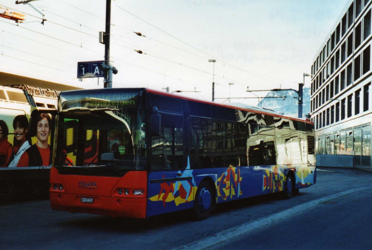 (115'034) - SBC Chur - Nr. 214/GR 157'214 - Neoplan am 14. Mrz 2009 beim Bahnhof Chur