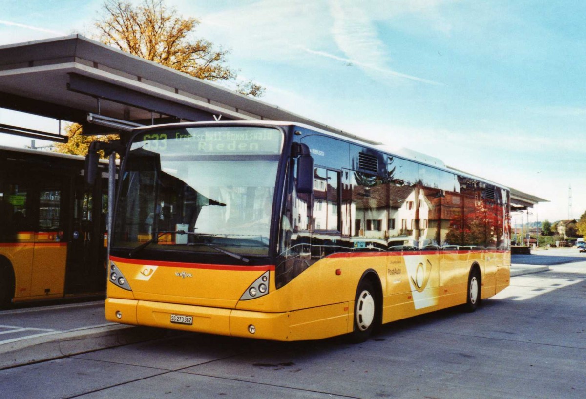 (121'727) - PostAuto Ostschweiz - SG 273'382 - Van Hool am 24. Oktober 2009 beim Bahnhof Uznach