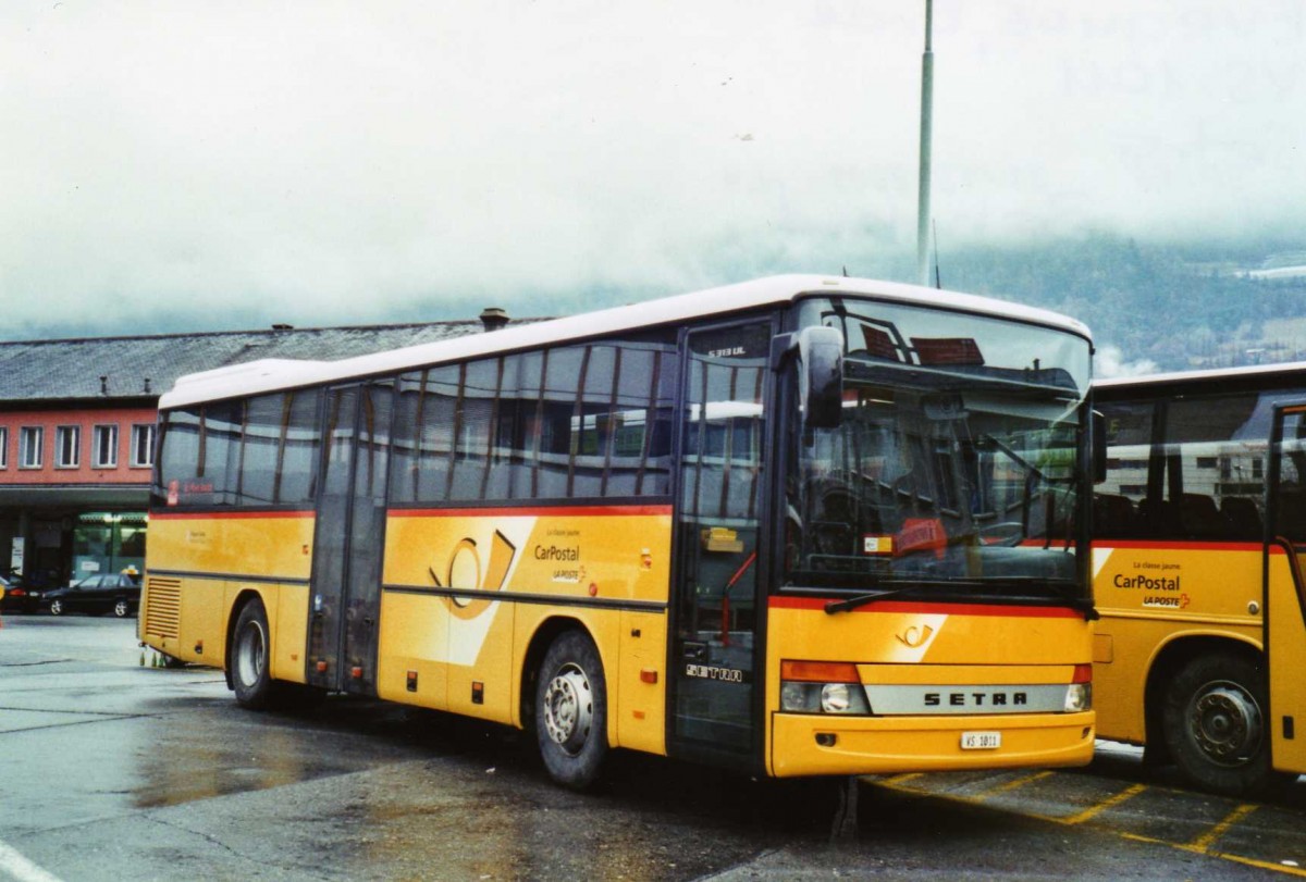 (122'737) - Evquoz, Erde - VS 1011 - Setra am 12. Dezember 2009 beim Bahnhof Sion