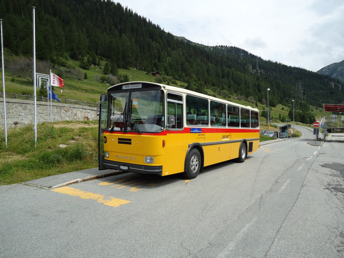 (127'544) - AVG Meiringen - Nr. 74/BE 607'481 - Saurer/R&J (ex P 24'357) am 4. Juli 2010 beim Bahnhof Oberwald