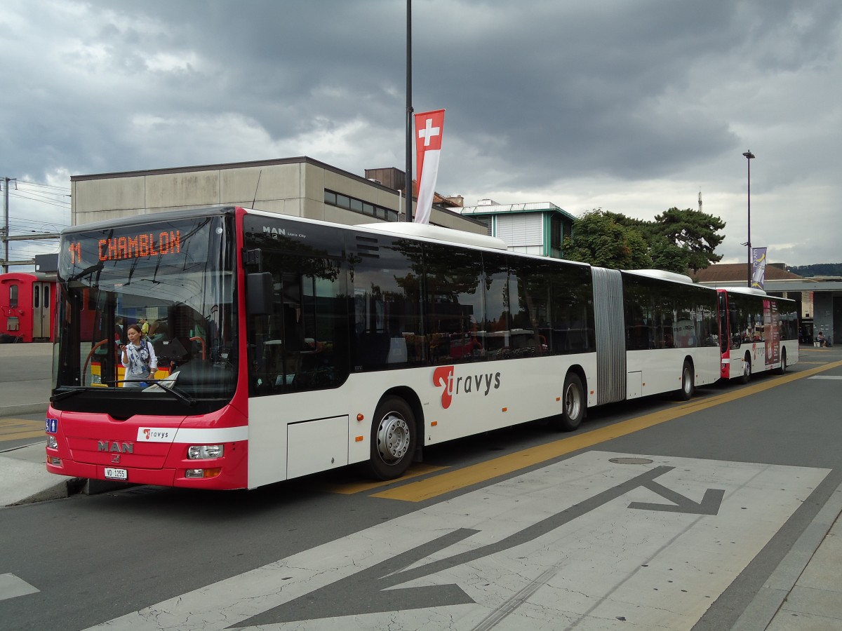 (128'096) - TRAVYS Yverdon - VD 1255 - MAN am 26. Juli 2010 beim Bahnhof Yverdon