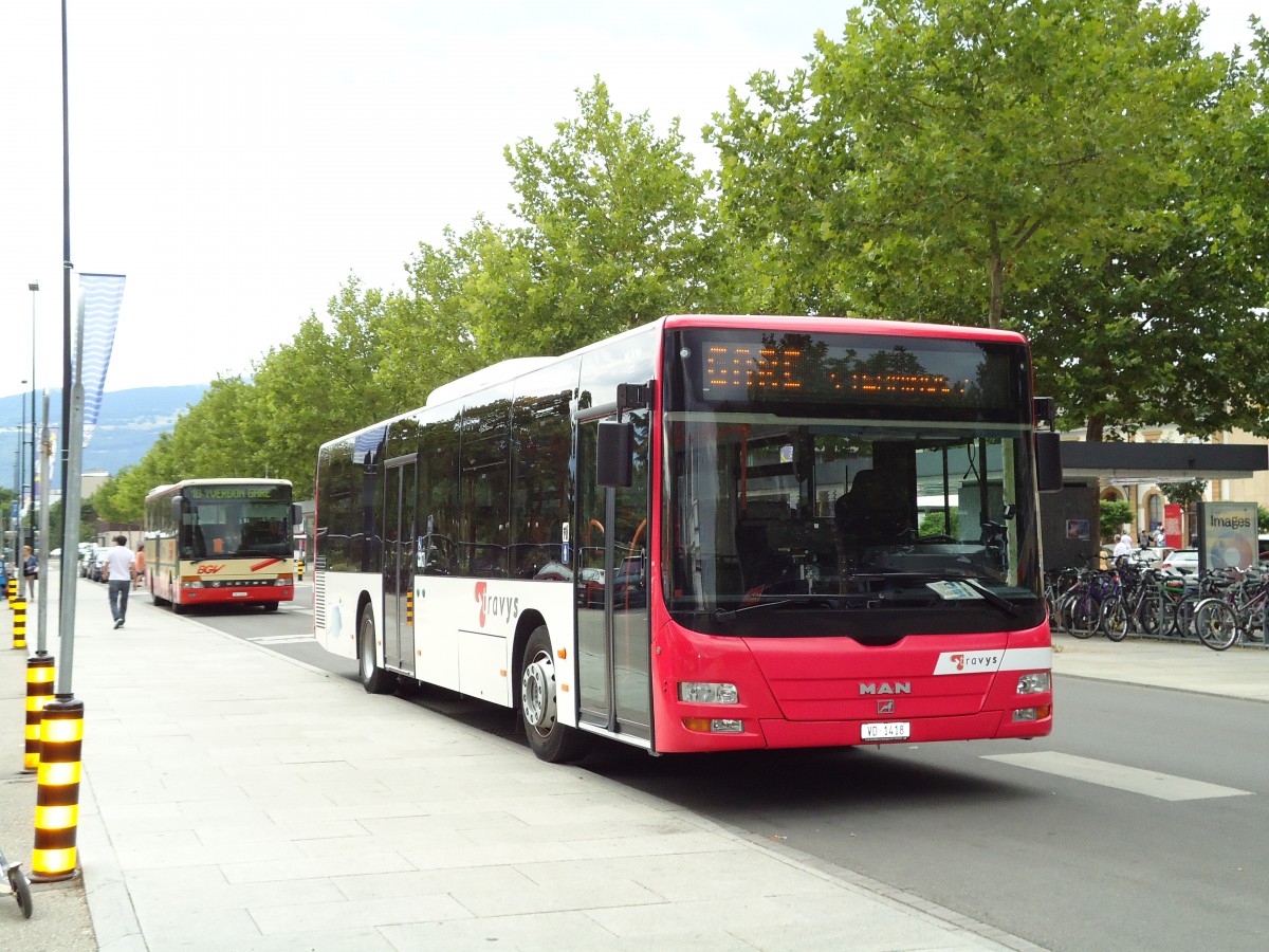 (128'099) - TRAVYS Yverdon - VD 1418 - MAN am 26. Juli 2010 beim Bahnhof Yverdon