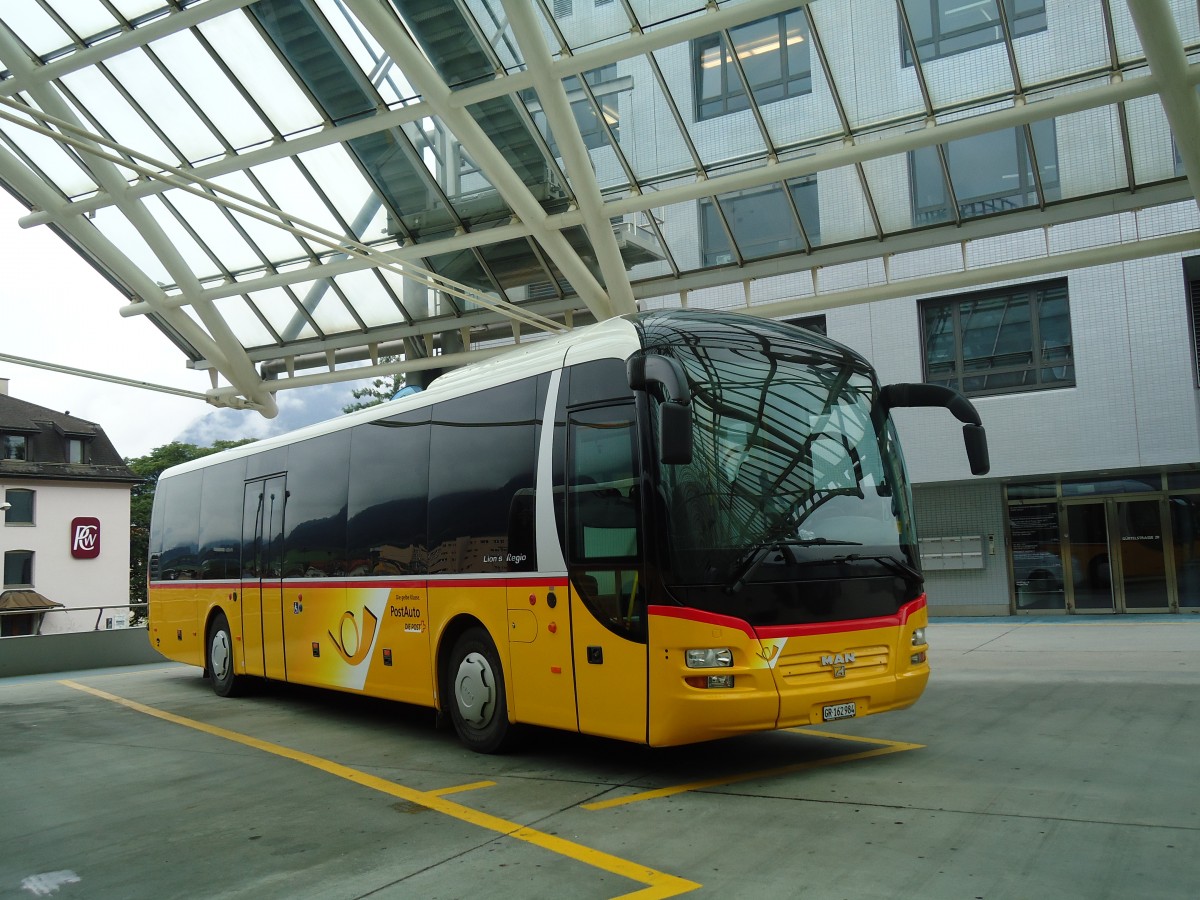 (129'756) - PostAuto Graubnden - GR 162'984 - MAN am 18. September 2010 in Chur, Postautostation