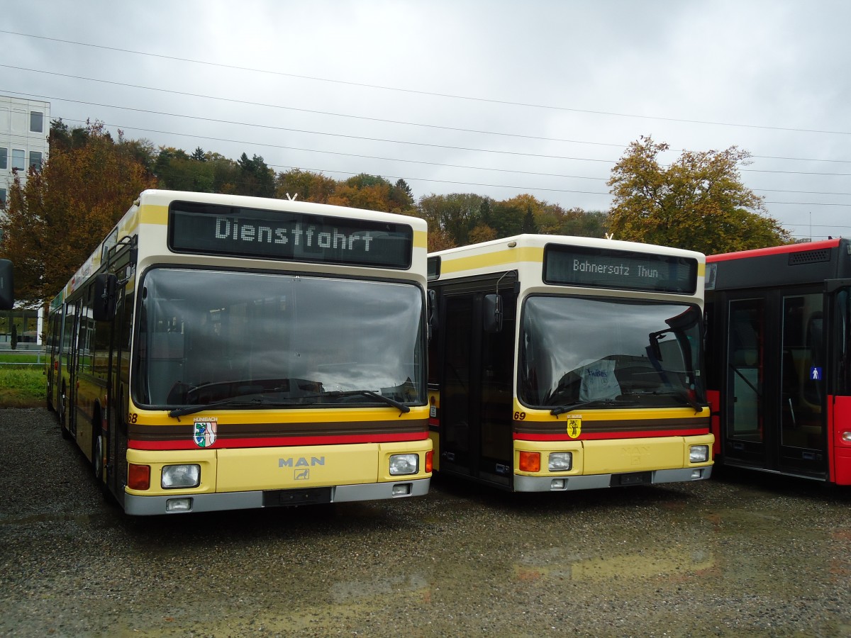 (130'766) - STI Thun - Nr. 68 + 68 - MAN am 24. Oktober 2010 in Kloten, EvoBus