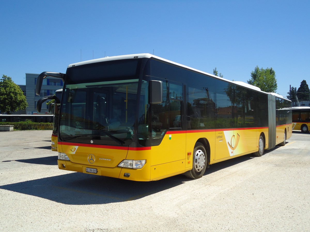 (133'905) - CarPostal - VD 386'069 - Mercedes am 29. Mai 2011 in Yverdon, Garage