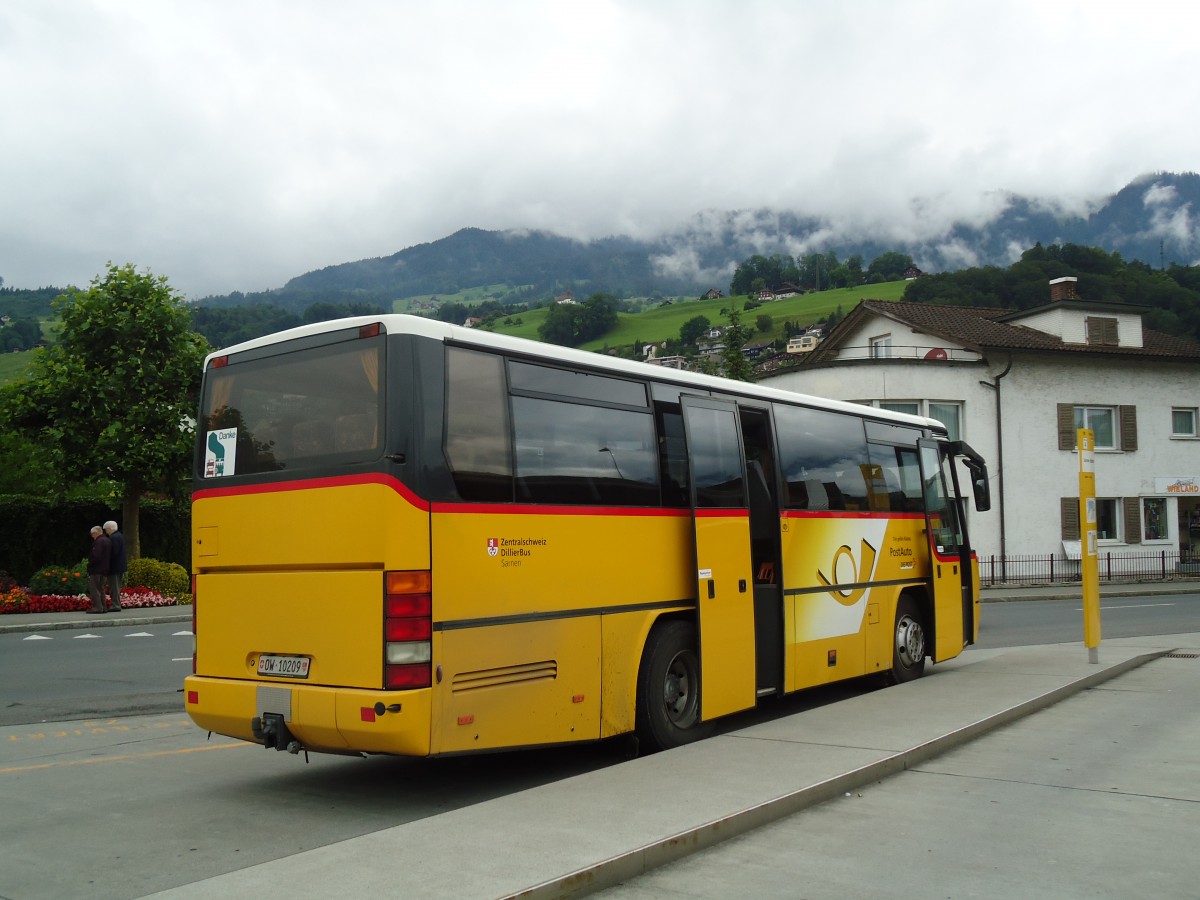 (134'162) - Dillier, Sarnen - Nr. 12/OW 10'209 - Neoplan am 11. Juni 2011 beim Bahnhof Sarnen