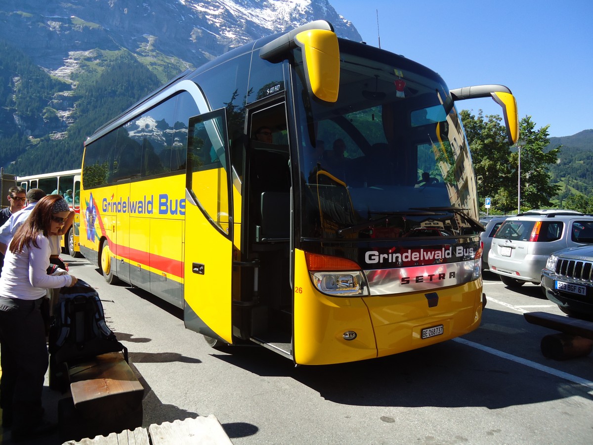 (134'680) - AVG Grindelwald - Nr. 26/BE 268'737 - Setra am 3. Juli 2011 beim Bahnhof Grindelwald