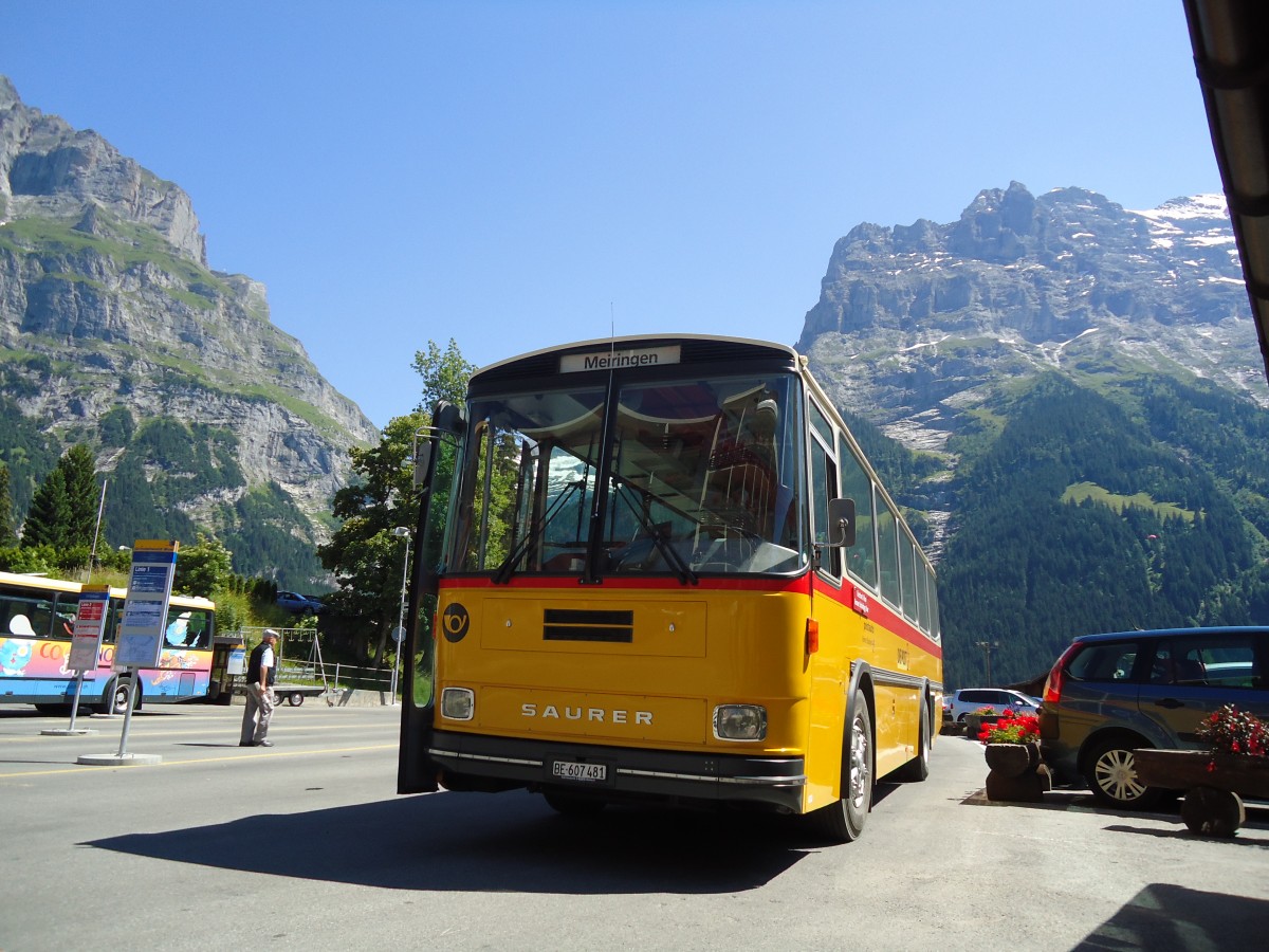 (134'748) - AVG Meiringen - Nr. 74/BE 607'481 - Saurer/R&J (ex P 24'357) am 3. Juli 2011 beim Bahnhof Grindelwald