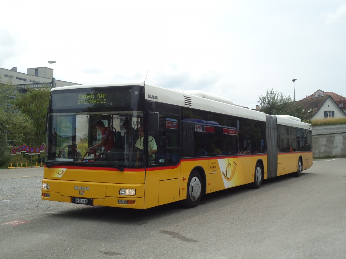 (134'892) - PostAuto Zrich - Nr. 144/ZH 780'686 - MAN (ex Nr. 21; ex P 26'016) am 10. Juli 2011 beim Bahnhof Frauenfeld