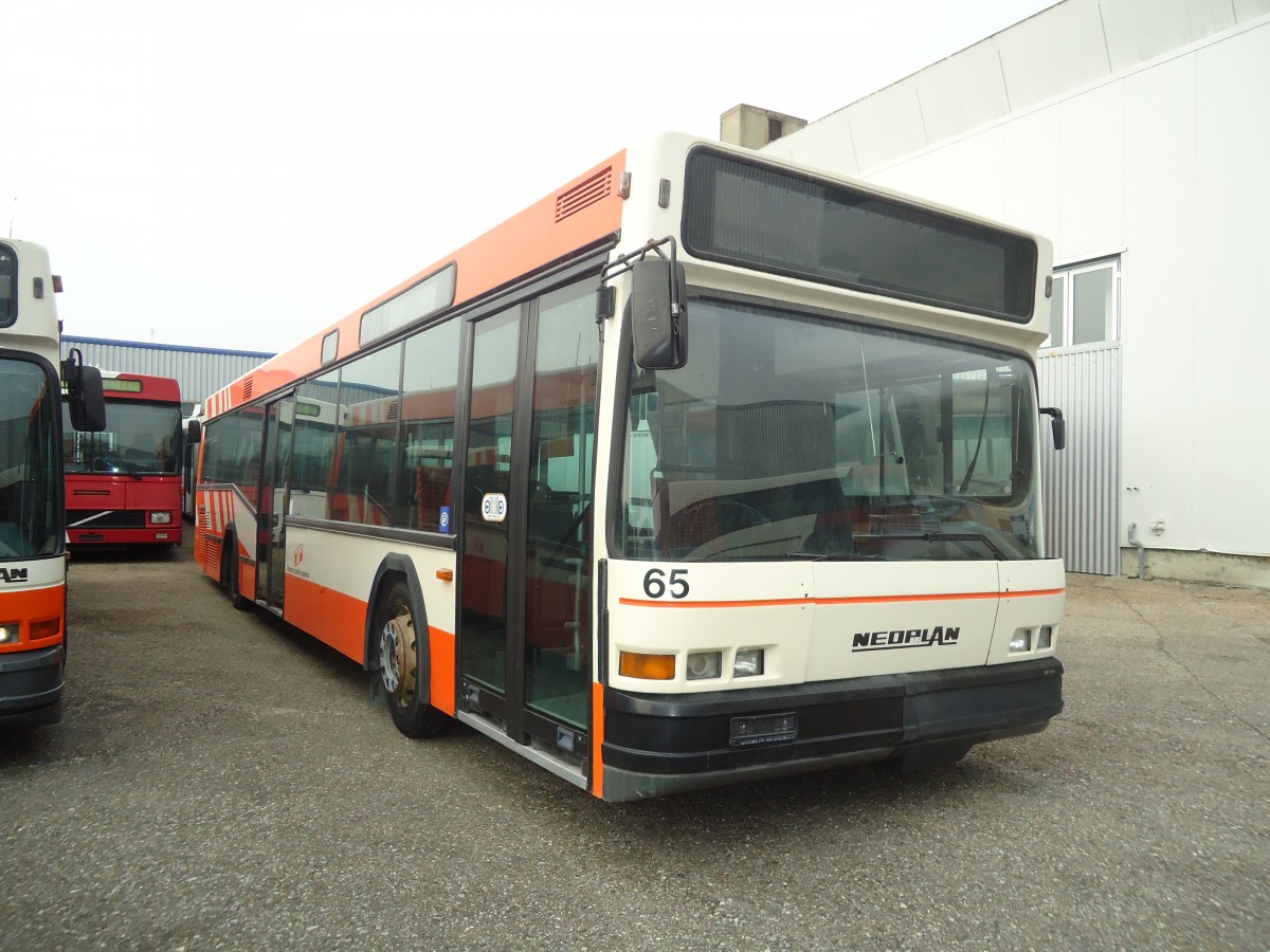 (137'018) - RATP, Satigny - Nr. 65 - Neoplan (ex Dupraz, Genve Nr. 65) am 26. November 2011 in Biel, Rattinbus