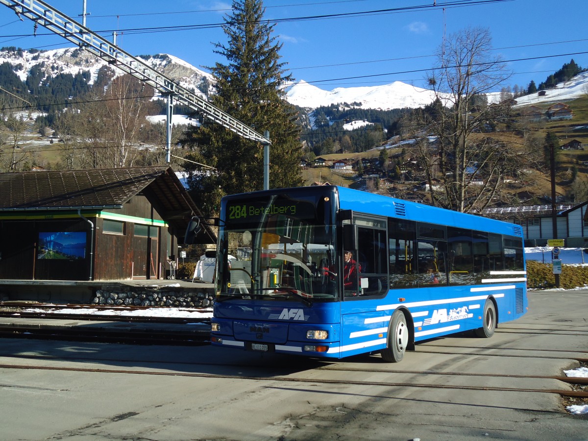 (137'140) - AFA Adelboden - Nr. 55/BE 611'055 - MAN/Gppel am 11. Dezember 2011 beim Bahnhof Lenk