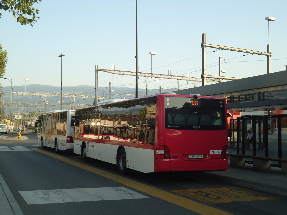 (140'943) - TRAVYS Yverdon - VD 599 - MAN am 27. Juli 2012 beim Bahnhof Yverdon