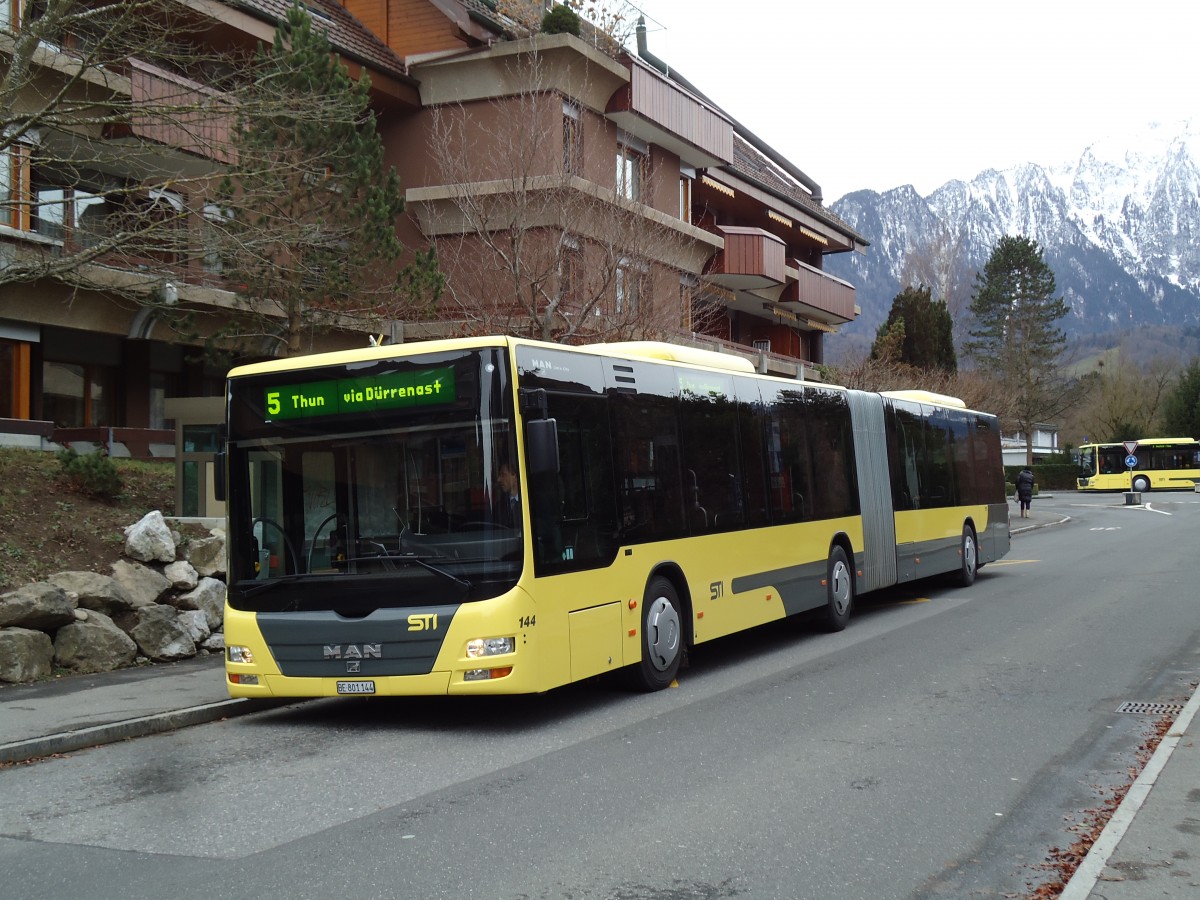 (142'697) - STI Thun - Nr. 144/BE 801'144 - MAN am 28. Dezember 2012 in Thun, Schorenfriedhof