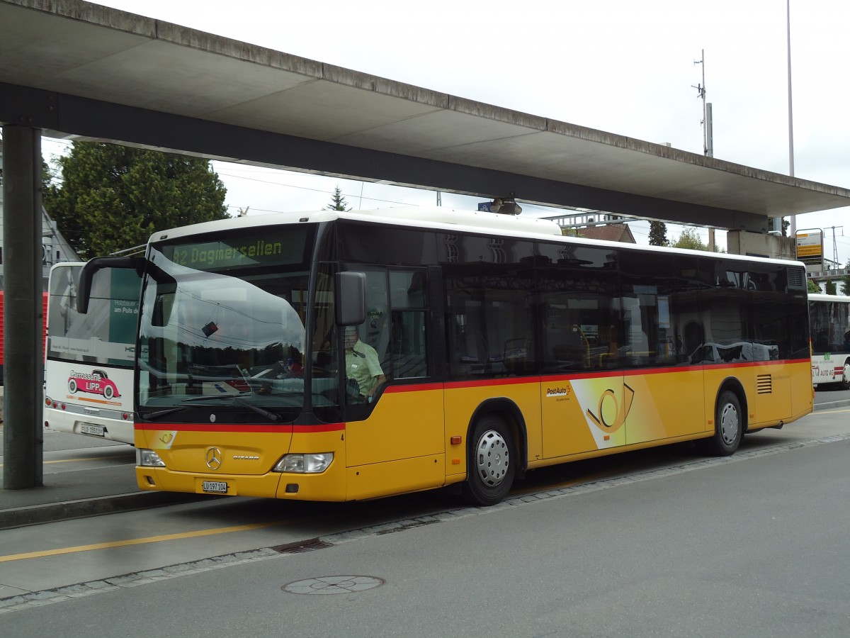 (144'931) - Hfliger, Sursee - Nr. 4/LU 197'104 - Mercedes (ex PostAuto Nordschweiz Nr. 4) am 10. Juni 2013 beim Bahnhof Sursee