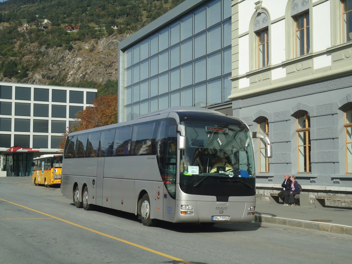 (147'294) - Aus Deutschland: Tirtey, Titz-Rdingen - DN-T 9950 - MAN am 22. September 2013 beim Bahnhof Brig