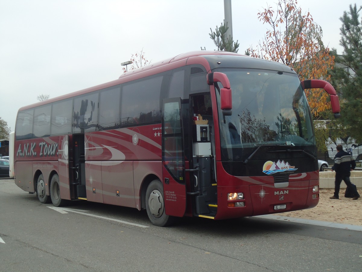 (148'116) - A.N.K. Tours, Muttenz - BL 7777 - MAN am 17. November 2013 beim Bahnhof Liestal