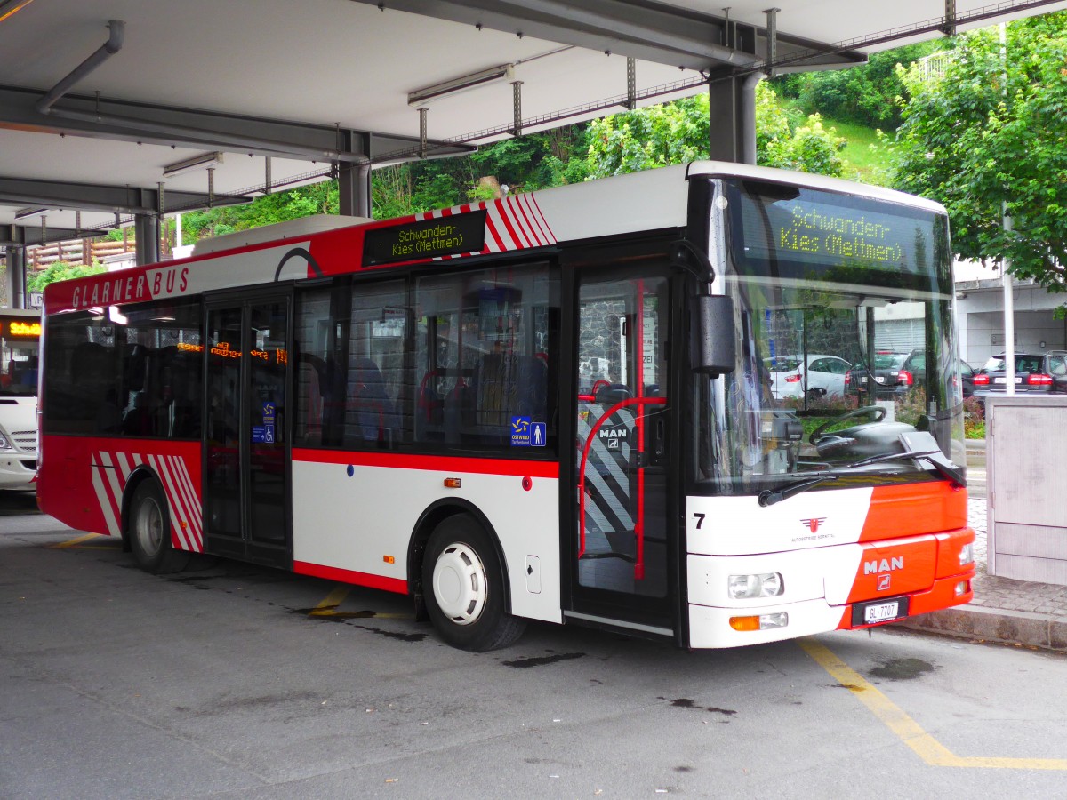 (151'827) - AS Engi - Nr. 7/GL 7707 - MAN/Gppel am 23. Juni 2014 beim Bahnhof Schwanden