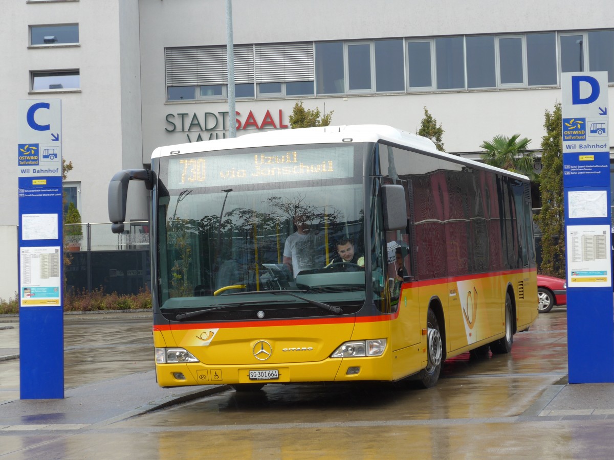 (153'925) - Schmidt, Oberbren - SG 301'664 - Mercedes am 16. August 2014 beim Bahnhof Wil