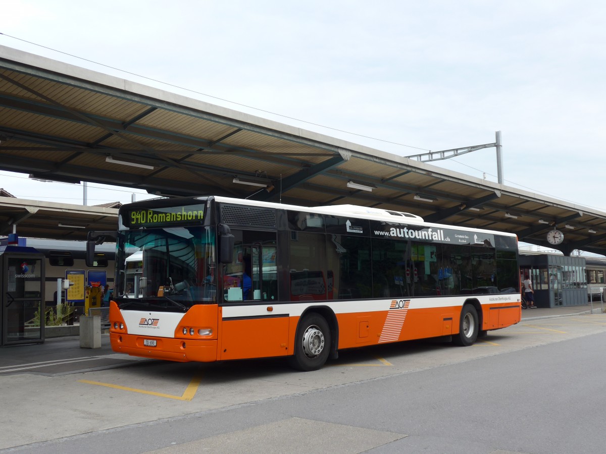 (154'275) - AOT Amriswil - Nr. 1/TG 690 - Neoplan (ex Vorfhrfahrzeug) am 20. August 2014 beim Bahnhof Romanshorn